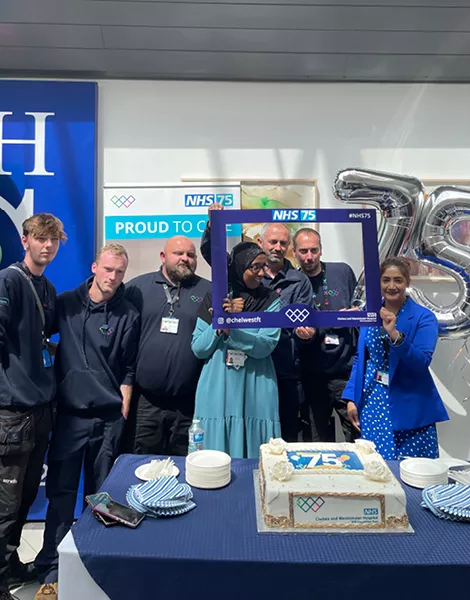Members of staff celebrating NHS 75