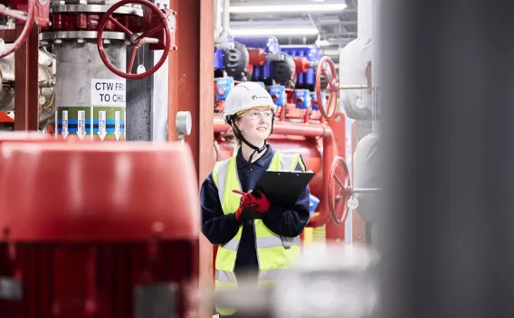 Equans employee inspecting industrial plant