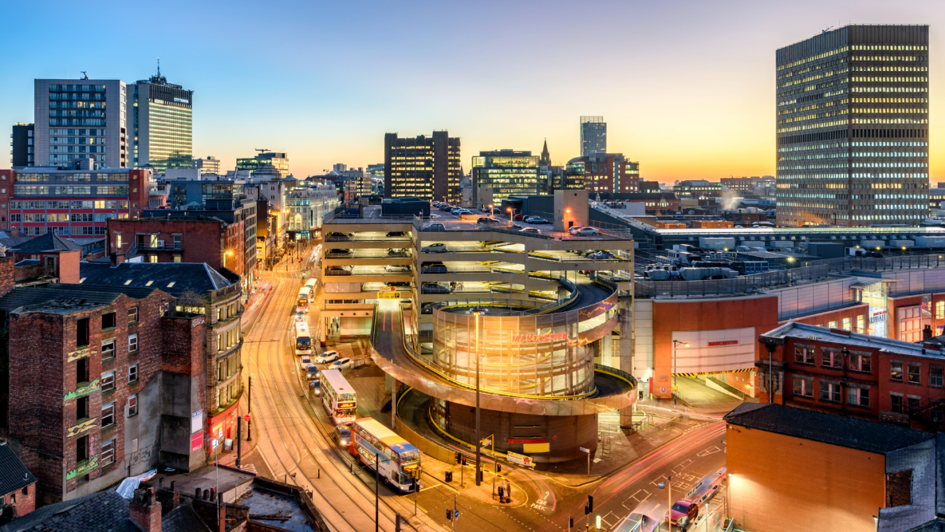 An aerial shot of Manchester by night