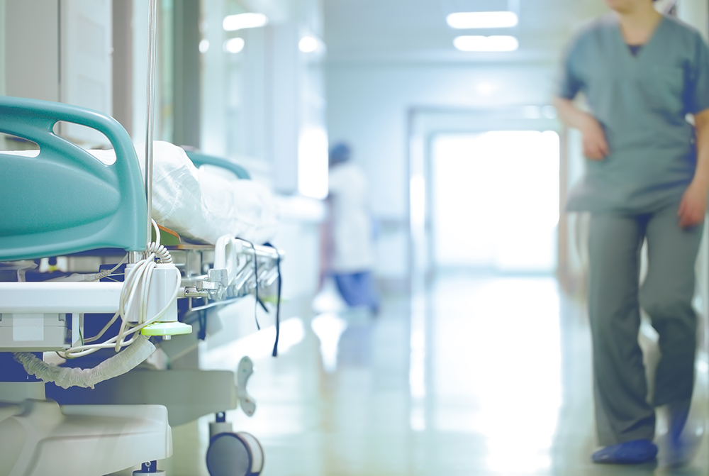 an image of hospital beds in corridor