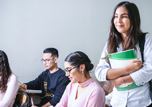 three students - one stood, two sat