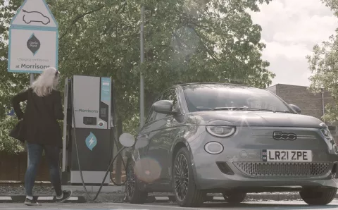 Grey Fiat 500 EV being charged on the genie point network