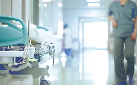 an image of hospital beds in corridor