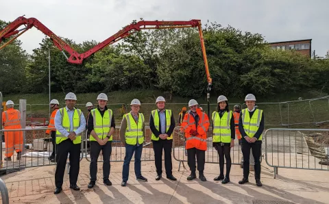 Members of the ammogen consortium on site during the laying of the foundations for the new facility 