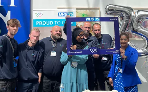 Members of staff celebrating NHS 75