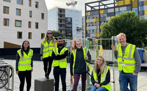 Image of members of staff in high visibility jacket 
